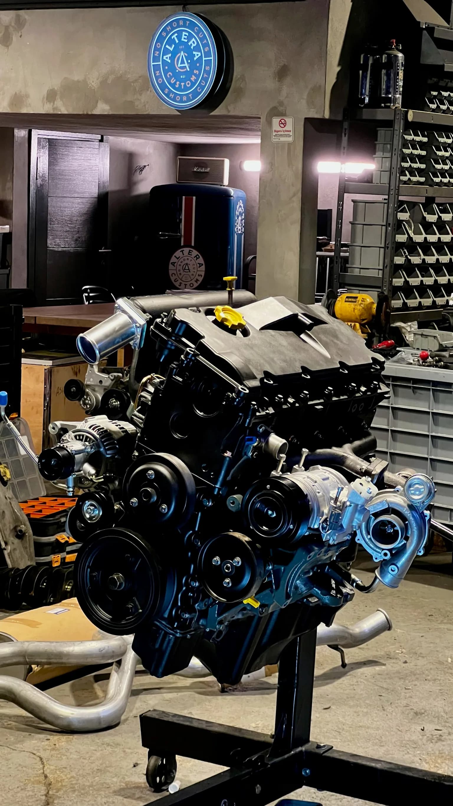 Engine being rebuilt on a bench in the Altera workshop