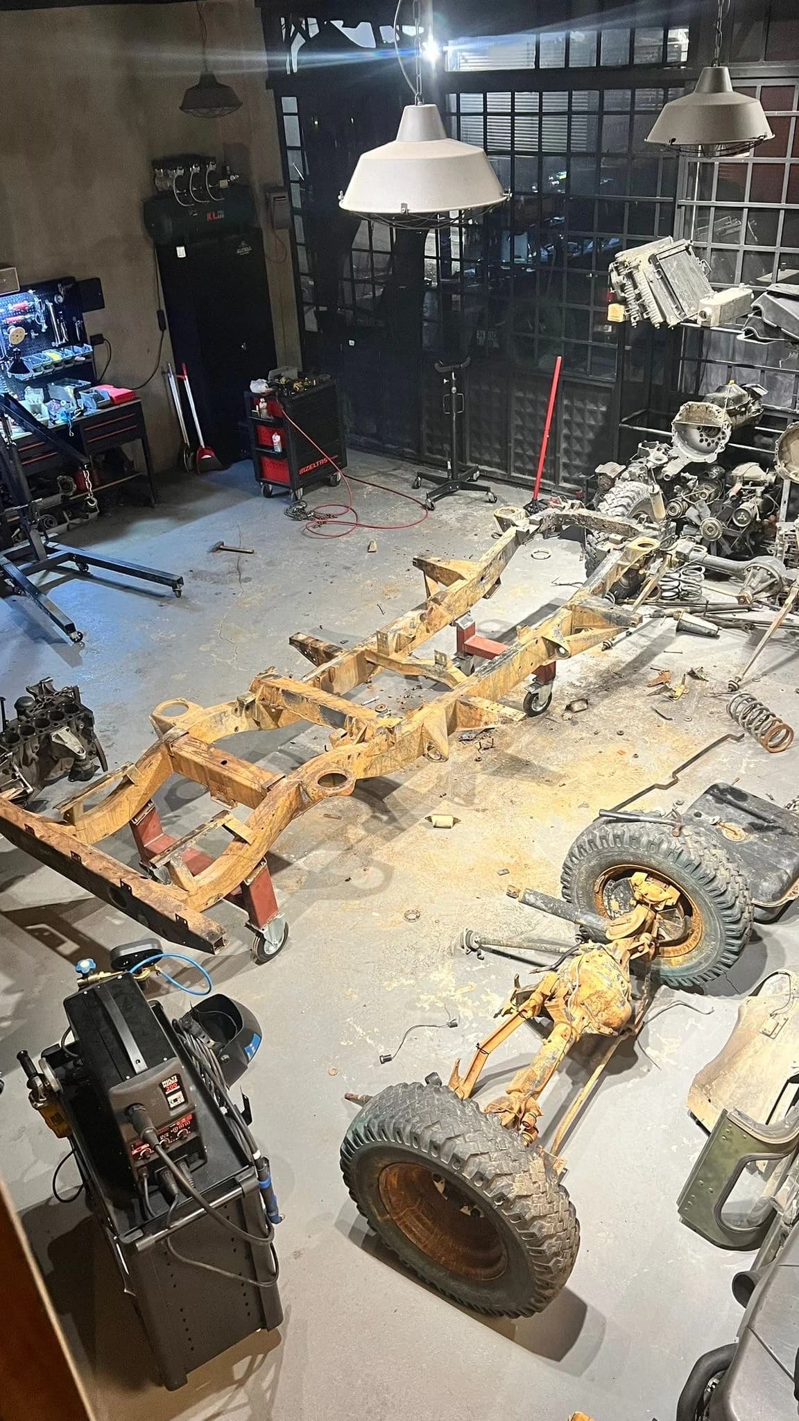 Defender chassis stripped to its structure in the Altera workshop